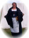 Janette standing in front of her tent.