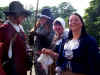 Some soldier's talking to the women of the camp.